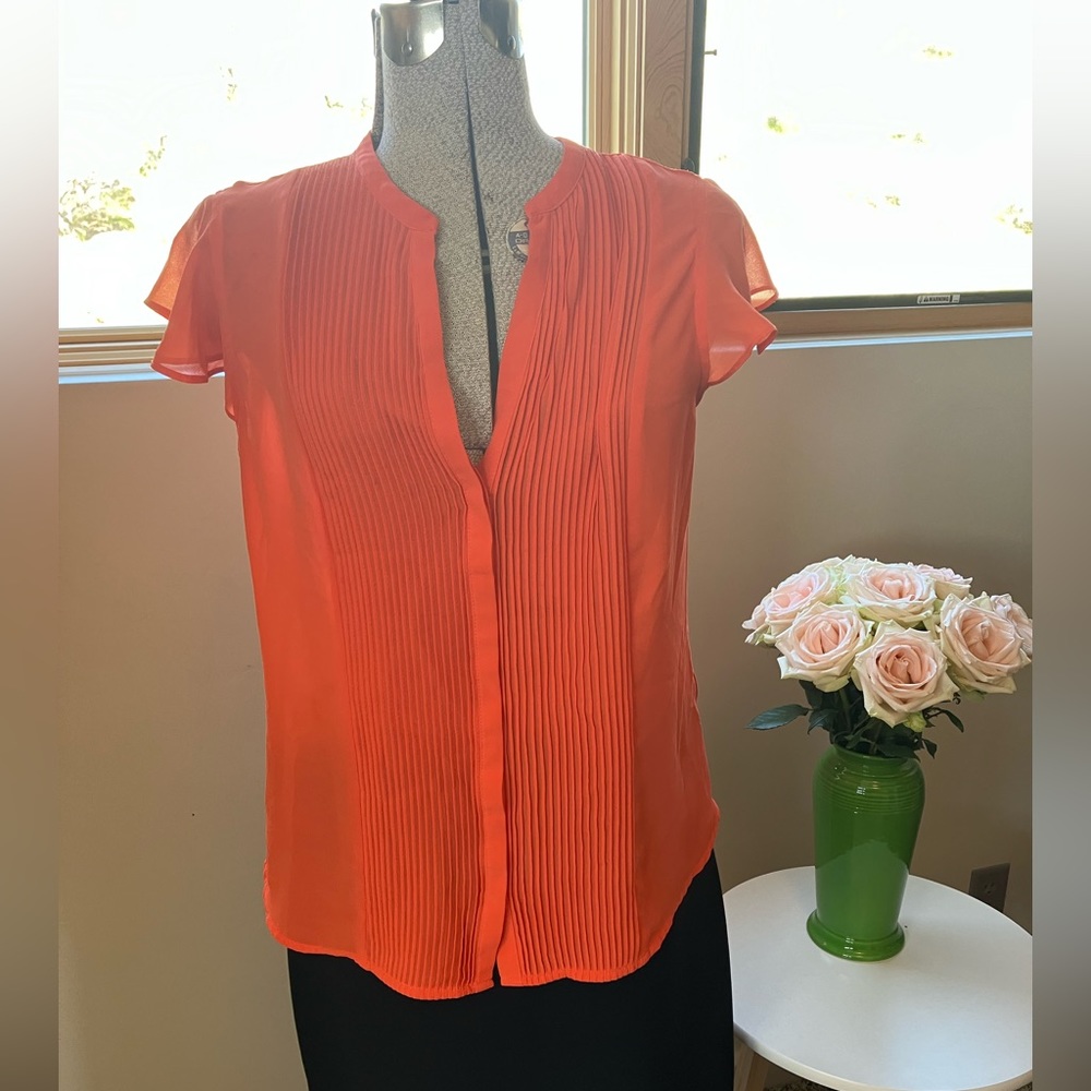 H&M staple pin tuck blouse to layer with all your suits, or with jeans! $12